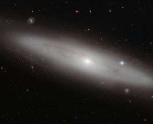 Title: High Scientist: Lenticular Galaxy in Virgo, Source:http://cdn.physorg.com/newman/gfx/news/2013/nasashubbles.jpg