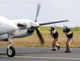 private plane pilots searched Source http://stopthedrugwar.org/files/imagecache/300px/CBP-officers-plane.jpg