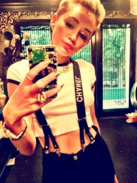 Miley Cyrus Tweets Pic of Self With Marijuana Leaf Phone Case