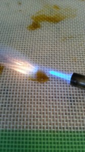 Wax starts to bubble and purge out some excess butane 